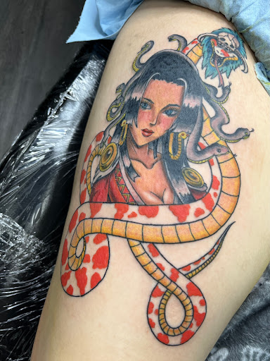 Explore pistol tattoo ideas, creative tattoo ideas in Roseville, available at Emerald Tattoo & Piercing - Roseville