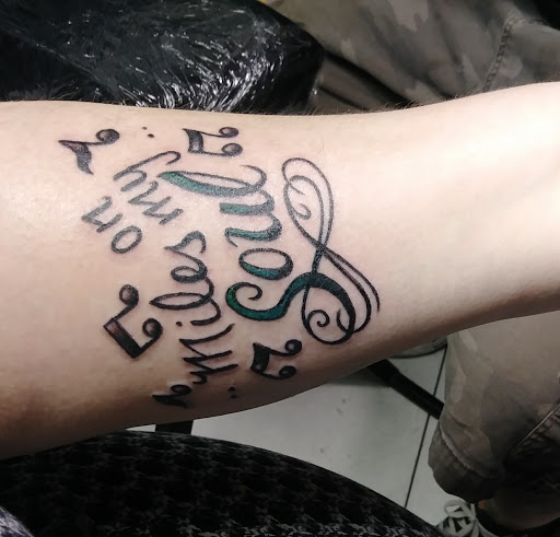 Explore peacock feather tattoo ideas, creative tattoo ideas in Orange Park, available at All Aces Tattoo and Body Piercing LLC