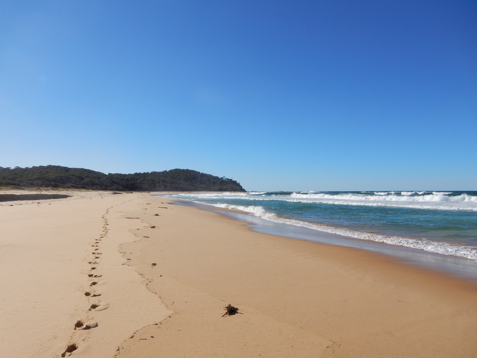 Fotografija Middle Beach z svetel fin pesek površino