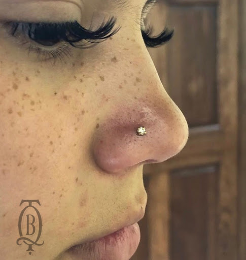 Explore cool chest tattoo ideas for guys, creative tattoo ideas in Marietta, available at The Queen Bee Tattoo and Piercing Parlour