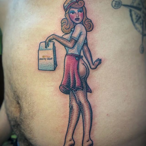 Explore shoulder tribal tattoo ideas, creative tattoo ideas in Vista, available at American Tattoo Vista