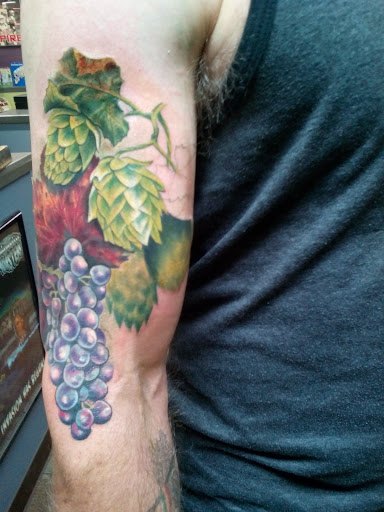 Explore 1/4 sleeve tattoo ideas, creative tattoo ideas in Springfield, available at Area 51 Tattoo