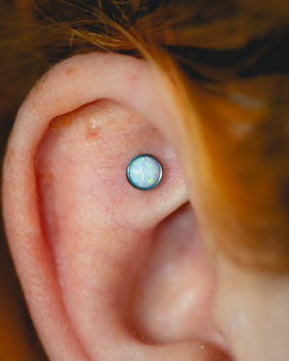 Explore god first tattoo ideas, creative tattoo ideas in Buffalo, available at Moria Piercing and Jewelry