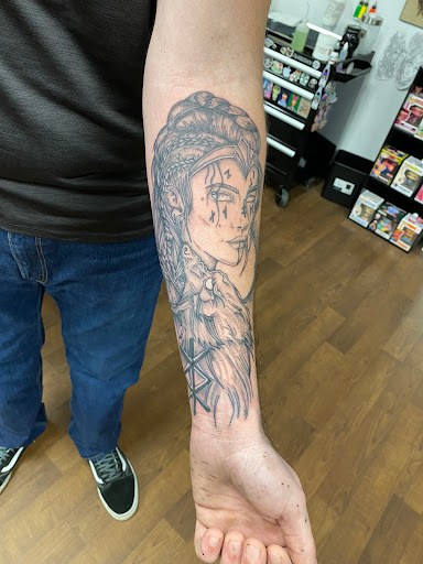 Explore lilo and stitch tattoo ideas, creative tattoo ideas in Jamestown, available at Black Cherry Tattoo Co.