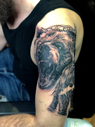 Explore angel chest tattoo ideas, creative tattoo ideas in Chicago, available at Revolution Tattoo