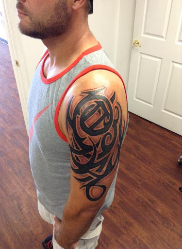 Explore tiny tattoo ideas with meaning, creative tattoo ideas in Seymour, available at American Gypsy Tattoo Corp.