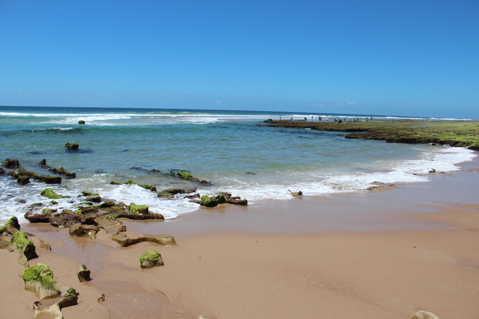 Foto van Oyster Bay Beach en de nederzetting