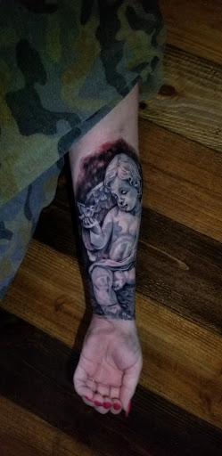 Explore sleeve tattoo ideas for women, creative tattoo ideas in Talbott, available at Alpha Tattoo co.