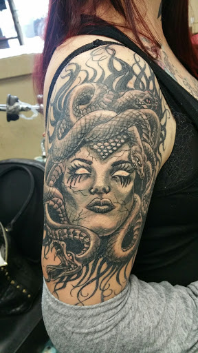 Explore tattoo ideas for hippies, creative tattoo ideas in Fort Mohave, available at RedRum Tattoo & Body Piercing Co.