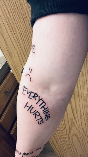 Explore cross stitch tattoo ideas, creative tattoo ideas in Minot, available at Psychward Tattoos and Piercings