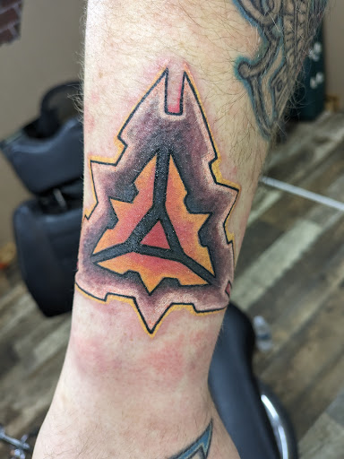 Explore mens behind the ear tattoo ideas, creative tattoo ideas in Sioux City, available at Asawolf Viking Tattoo