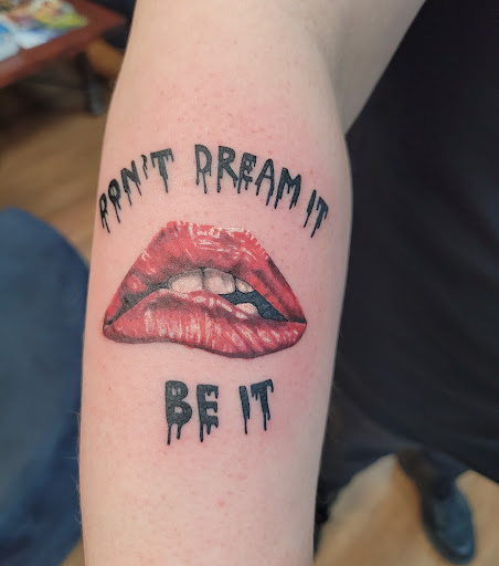 Explore trisomy 21 tattoo ideas, creative tattoo ideas in Anniston, available at Lucid Dreams Tattoos and Piercings