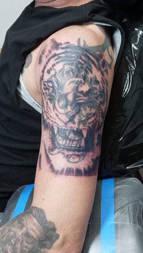 Explore small crow tattoo ideas, creative tattoo ideas in Springfield, available at Red Tip Tattoos