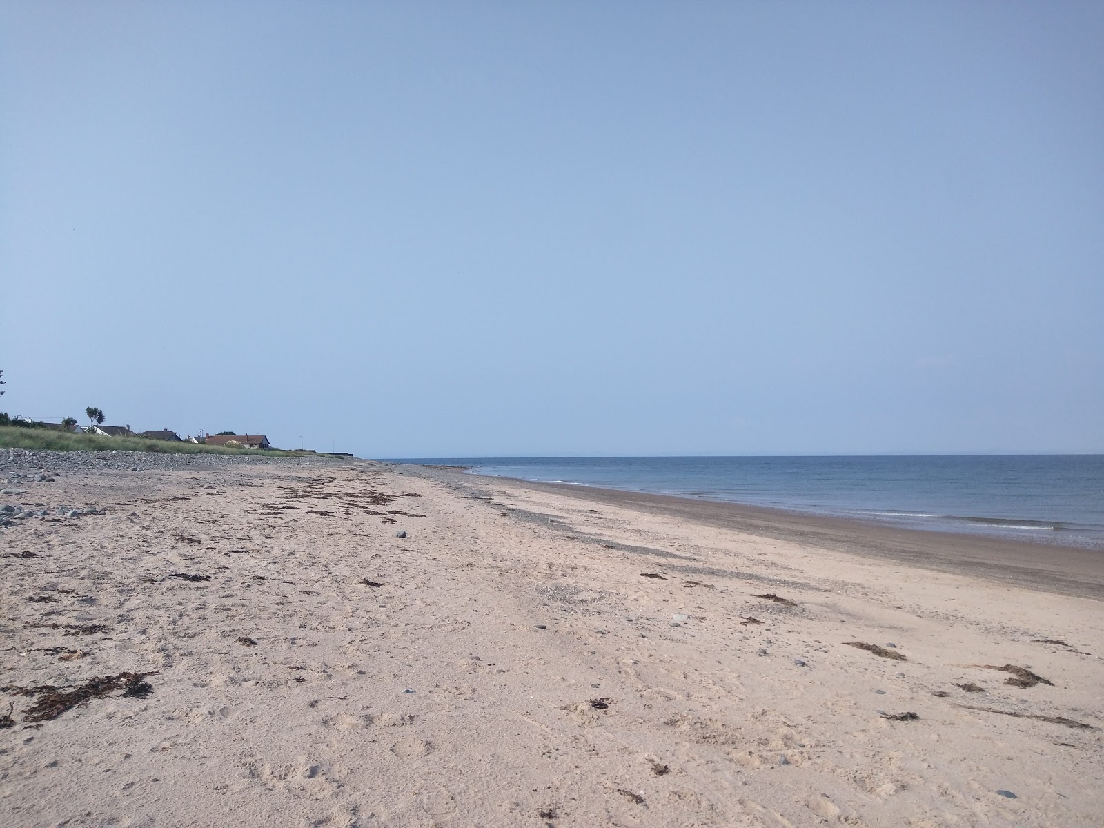 Foto van Cairngarroch Bay Beach met een ruime kustlijn