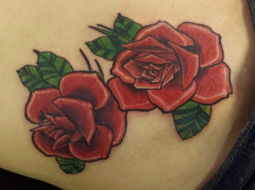 Explore dark skin male black skin tattoo ideas, creative tattoo ideas in Mesa, available at Ranger Tattoo & Piercing