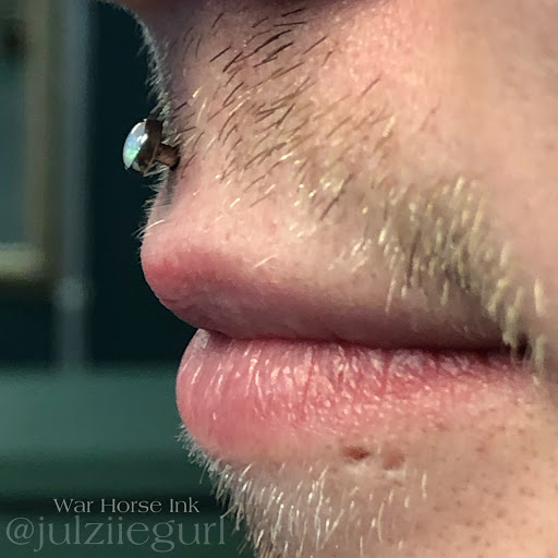 Explore soccer ball tattoo ideas, creative tattoo ideas in Kent, available at War Horse Ink