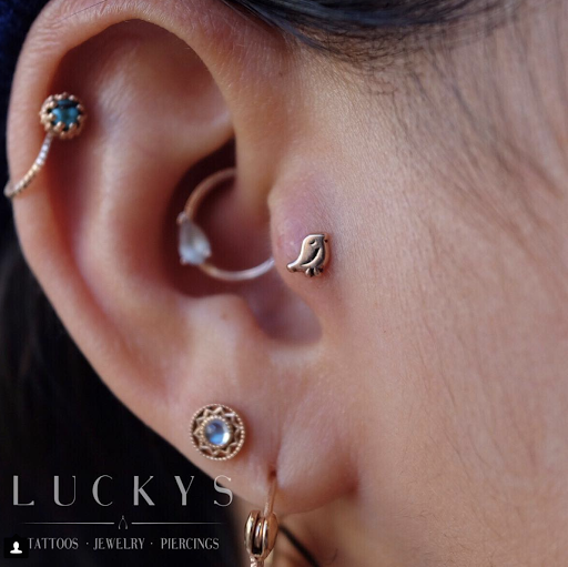 Explore chin tattoo ideas, creative tattoo ideas in Cambridge, available at Luckys Tattoo and Piercing