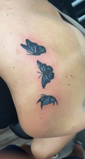 Explore joy tattoo ideas, creative tattoo ideas in Buffalo, available at East Coast Ink