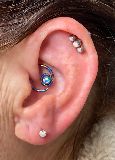 Explore honeycomb tattoo ideas, creative tattoo ideas in Springfield, available at Body Piercing By Qui Qui