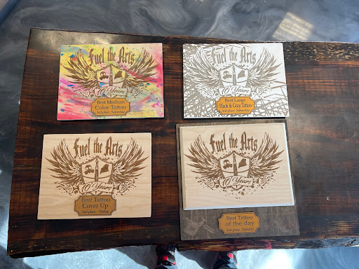 Explore cover up tattoo ideas male arm, creative tattoo ideas in Auburn, available at Black Lantern Tattoo Gallery