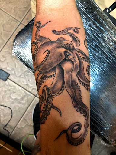 Explore gym tattoo ideas, creative tattoo ideas in Okeechobee, available at Muck City Tattoos & Piercings