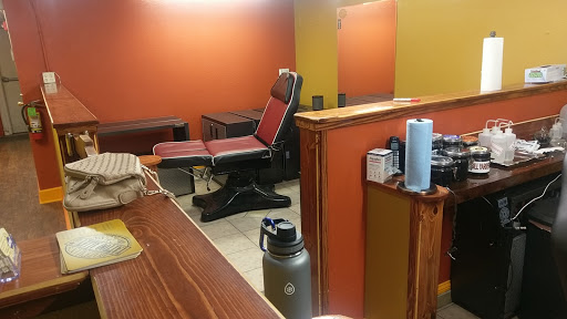 Explore grinch tattoo ideas, creative tattoo ideas in Bozeman, available at Bozemans Tattoo Alley LLC