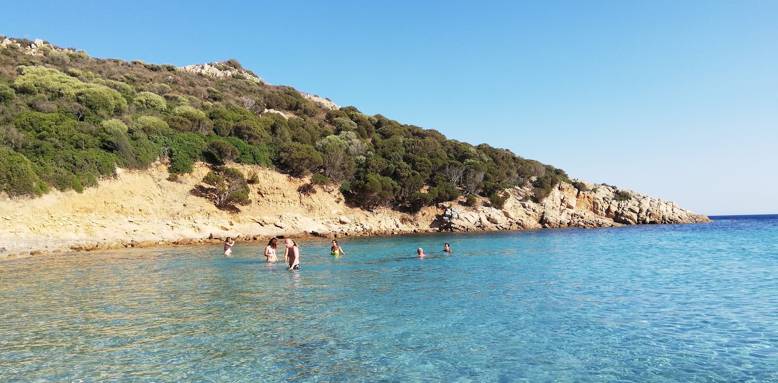 Foto de Praia de S'ortixeddu - recomendado para viajantes em família com crianças