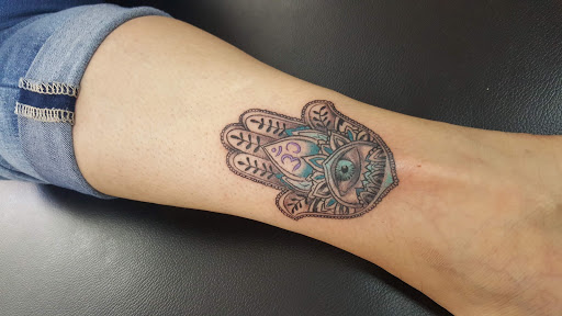 Explore snake tattoo ideas, creative tattoo ideas in Garden Grove, available at Dr. Tattoo Studio