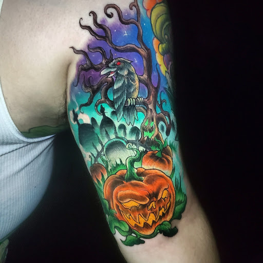 Explore the crow tattoo ideas, creative tattoo ideas in Buford, available at Inked Arts Tattoo Studio