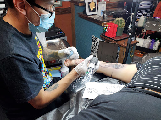 Explore under chin tattoo ideas, creative tattoo ideas in Albuquerque, available at Iron Anchor Tattoo Parlour