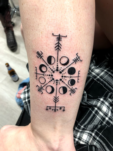 Explore neck tattoos for women ideas, creative tattoo ideas in Lakeland, available at Lyons Den Tattoo Company