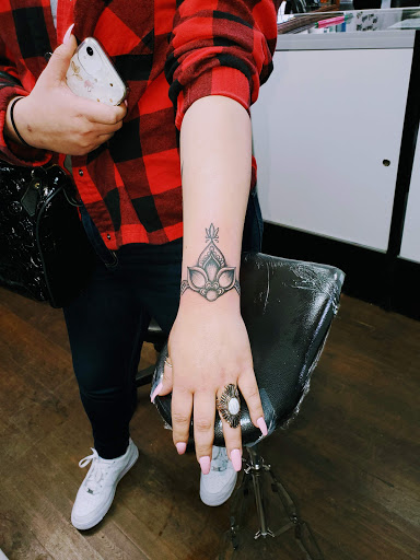 Explore tattoo cover up ideas for hand, creative tattoo ideas in Lubbock, available at Sinners & Saints Art Company