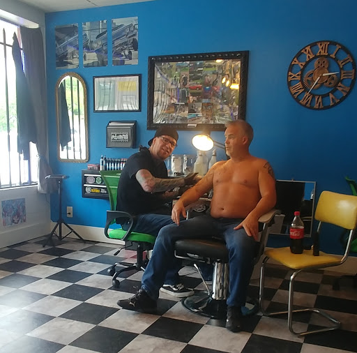 Explore arm cross tattoo ideas, creative tattoo ideas in Independence, available at Time Machine Tattoo