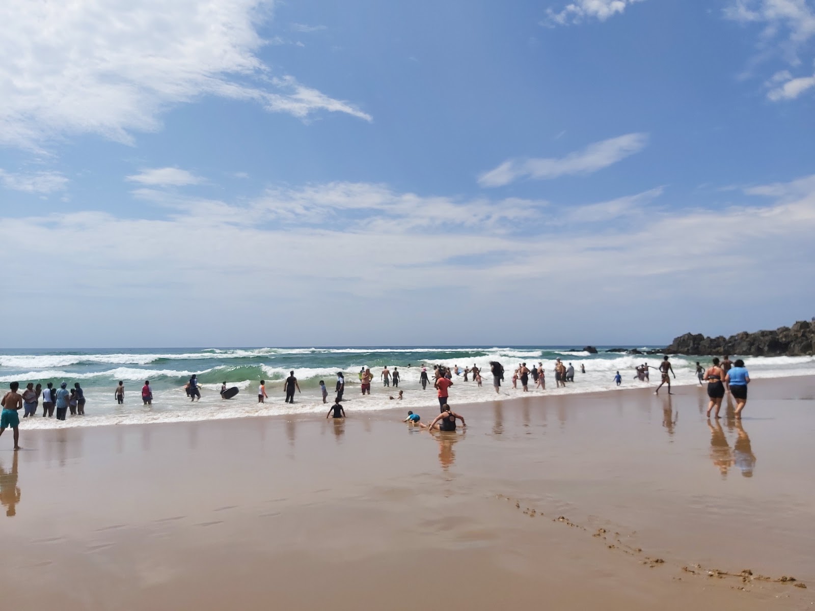 Foto av St Winifred's beach - populär plats bland avkopplingskännare