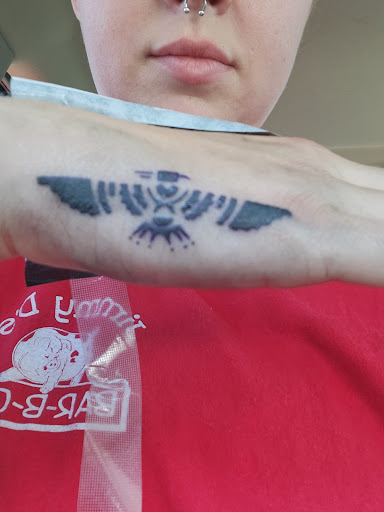 Explore stomach tattoo ideas for men, creative tattoo ideas in Clarksville, available at Dark Raine Tattoo