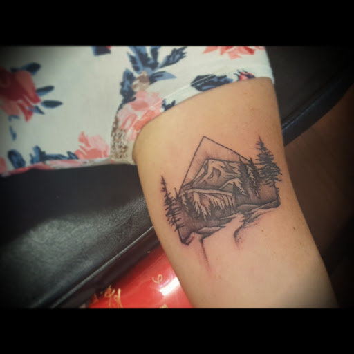 Explore name hand tattoo ideas, creative tattoo ideas in Hood River, available at Hood River Tattoo