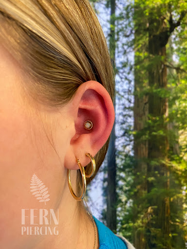 Explore toy story tattoo ideas, creative tattoo ideas in Greensboro, available at Fern Piercing and Fine Jewelry