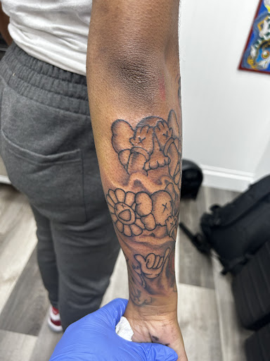 Explore ambigram tattoo ideas, creative tattoo ideas in Libertyville, available at Art With Atattooed