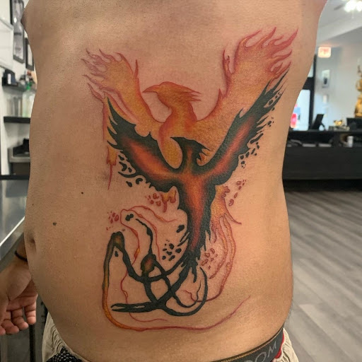 Explore giraffe tattoo ideas, creative tattoo ideas in Coral Springs, available at Salvation Tattoo Lounge Coral Springs