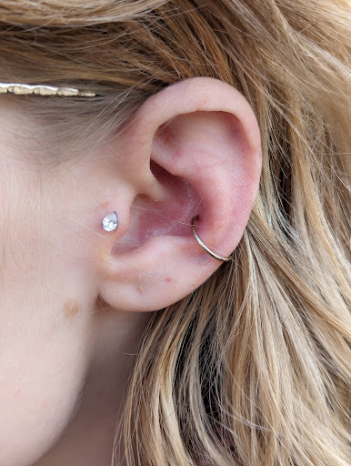 Explore wrap tattoo ideas, creative tattoo ideas in Salem, available at Thistle Piercing & Fine Jewelry