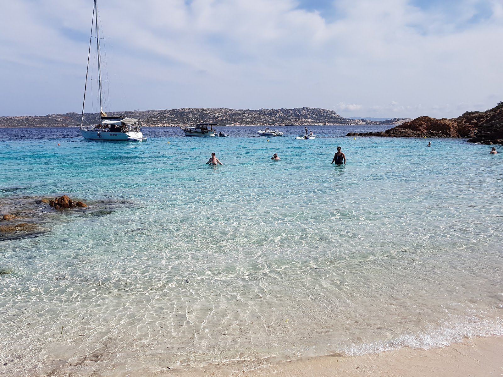 Foto di Spiaggia di Cala Dell'amore II con una superficie del acqua cristallina