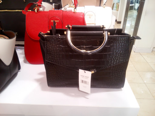 Stores to buy adolfo dominguez handbags Panama