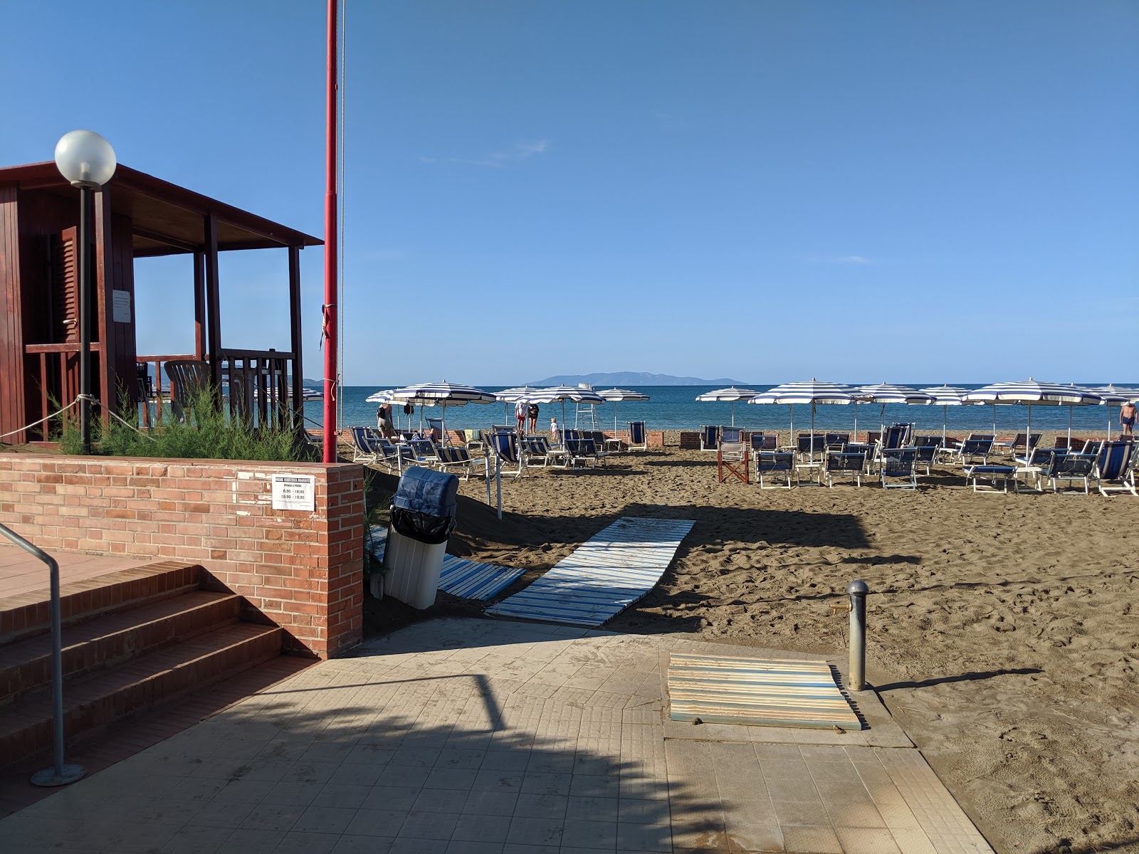 Fotografie cu Spiaggia Dell'Osa - locul popular printre cunoscătorii de relaxare