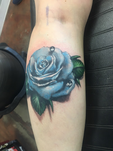 Explore book tattoo ideas, creative tattoo ideas in Federal Way, available at Jurassic Ink Tattoo Co.