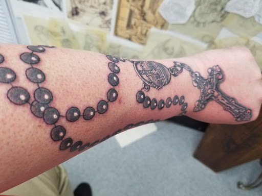 Explore nephew tattoo ideas, creative tattoo ideas in Leesburg, available at Trademark Body Art