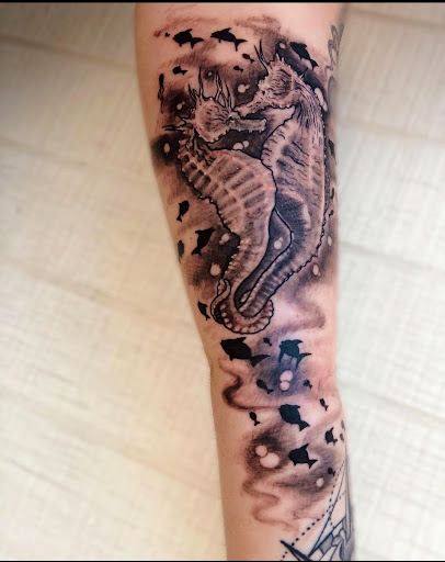 Explore trident tattoo ideas, creative tattoo ideas in Homosassa, available at Citrus Tattoos