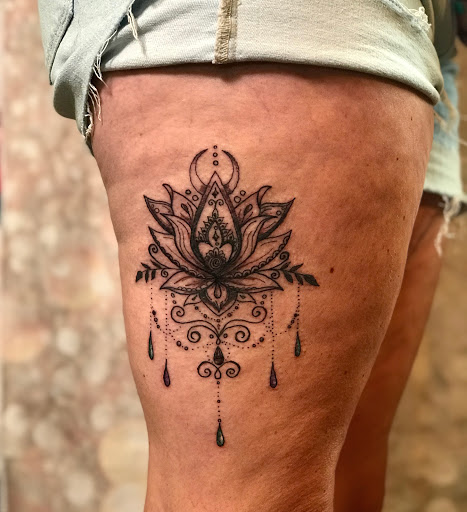 Explore sexy tattoo ideas for guys, creative tattoo ideas in Stowe, available at World Famous Monkey House Customs