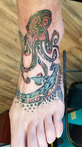 Explore evil eye tattoo ideas, creative tattoo ideas in Muncie, available at Abandon all hope tattoo and body piercing