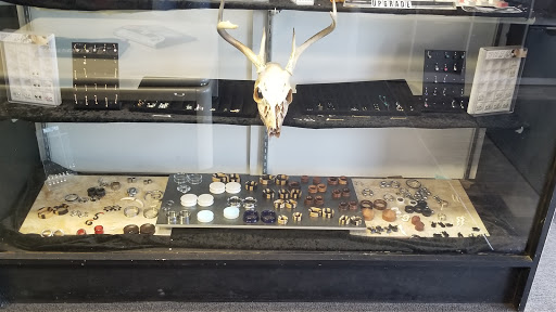 Tattoo Shop «Absolute Tattoo & Piercing», reviews and photos, 305 US-27, Minneola, FL 34715, USA