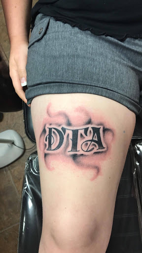 Explore butt cheek tattoo ideas, creative tattoo ideas in Foley, available at Black Sheep Custom Tattoos and Piercings